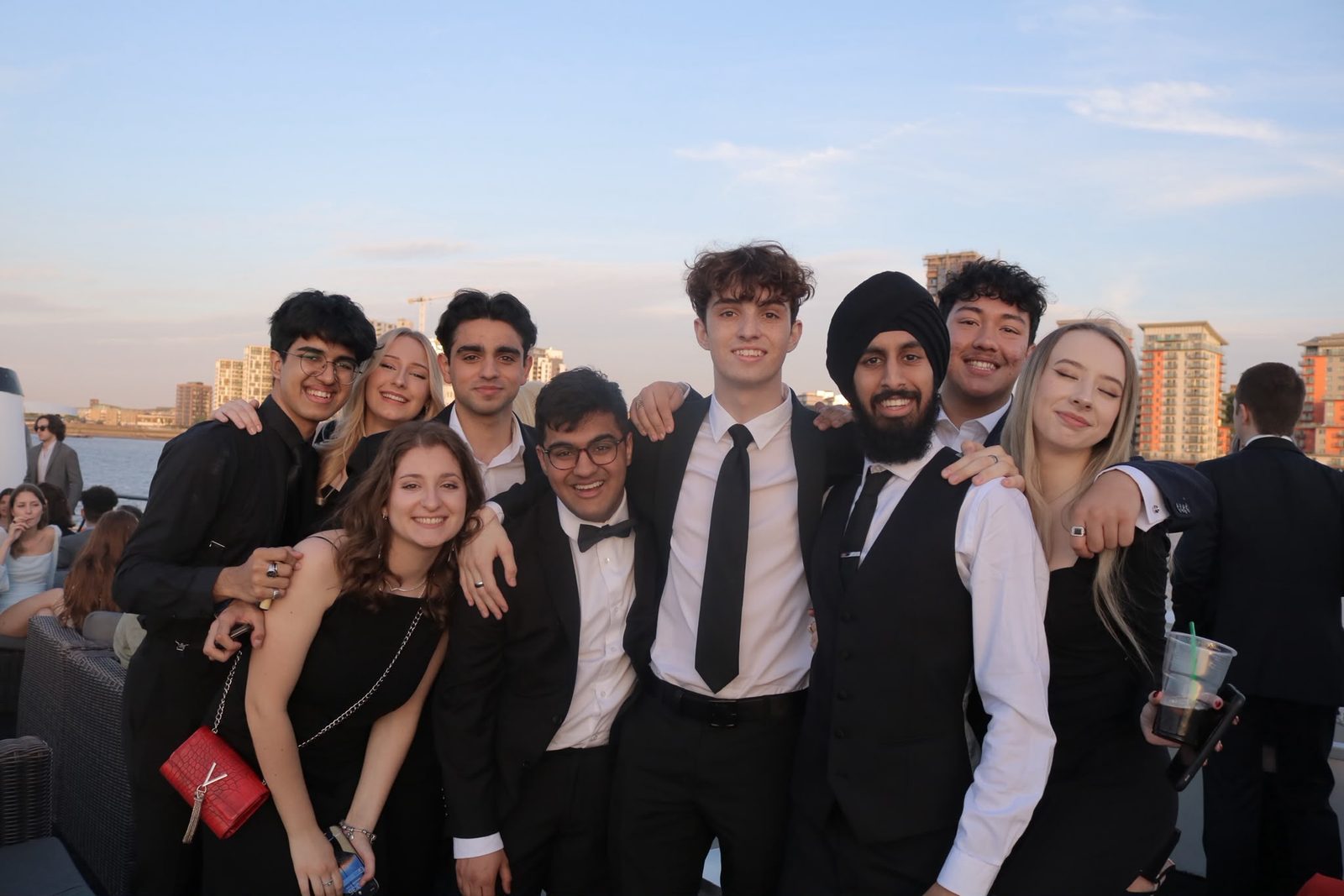 Nirmit with a group of friends dressed up by the river